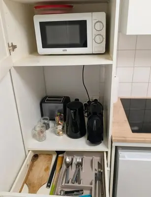 Cuisine ou kitchenette dans l'établissement Paisible - Proche Palais des Sports et Zénith
