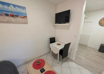 Télévision ou salle de divertissement dans l'établissement Paisible - Proche Palais des Sports et Zénith