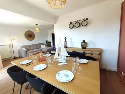 Coin salon dans l'établissement Le Balnéo Duplex avec balcon - Riva Bella Plage