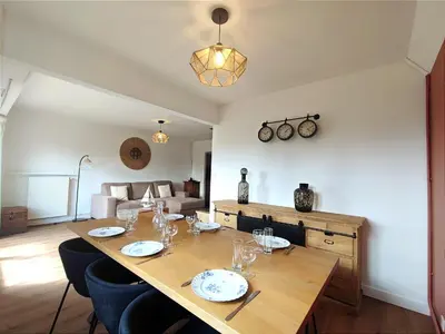Coin salon dans l'établissement Le Balnéo Duplex avec balcon - Riva Bella Plage