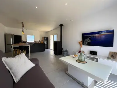 Cuisine ou kitchenette dans l'établissement Maison neuve proche plage avec parking gratuit