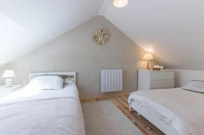 Un ou plusieurs lits dans un hébergement de l'établissement La Maison du Fort