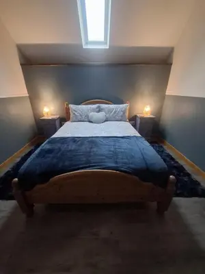 Un ou plusieurs lits dans un hébergement de l'établissement Perfect Gites In Normandy - New Beginnings Barn
