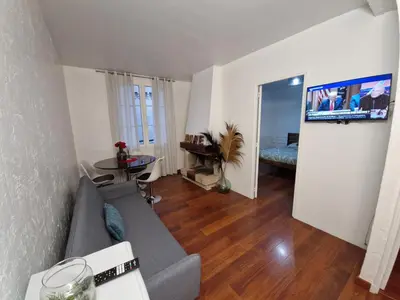 Télévision ou salle de divertissement dans l'établissement Appartement Lumineux Caen