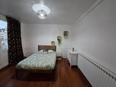 Un ou plusieurs lits dans un hébergement de l'établissement Appartement Lumineux Caen