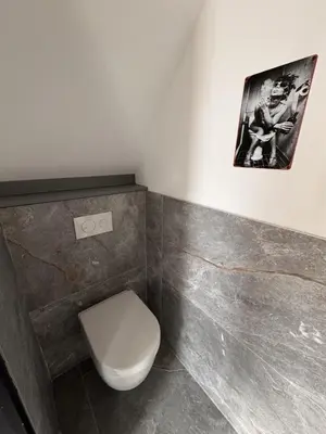 Salle de bains dans l'établissement Le tilou