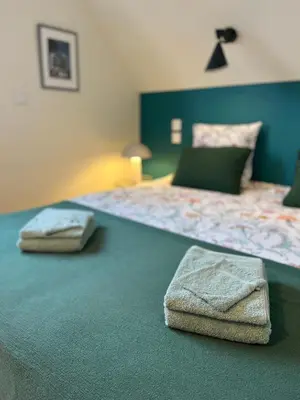 Un ou plusieurs lits dans un hébergement de l'établissement Harmonie Côtière - Belle Maison neuve bord de mer et plages du Débarquement
