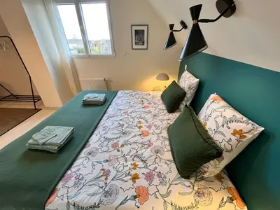 Un ou plusieurs lits dans un hébergement de l'établissement Harmonie Côtière - Belle Maison neuve bord de mer et plages du Débarquement