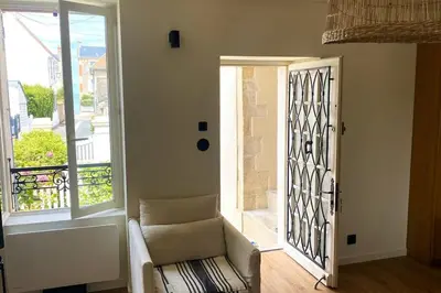 Coin salon dans l'établissement La perle-Maison de pêcheur à Saint-Aubin-sur-Mer