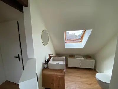 Un ou plusieurs lits dans un hébergement de l'établissement La perle-Maison de pêcheur à Saint-Aubin-sur-Mer