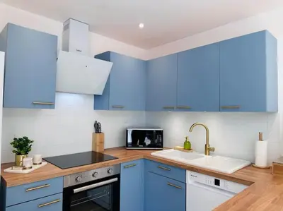 Cuisine ou kitchenette dans l'établissement Appartement Au Cœur de Granville