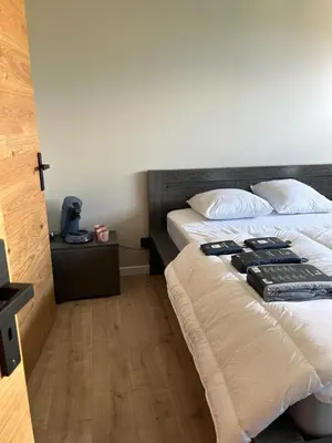 Un ou plusieurs lits dans un hébergement de l'établissement Chambre Rozanna