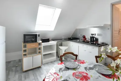 Cuisine ou kitchenette dans l'établissement Pura Vida - Appt à 400m de la plage