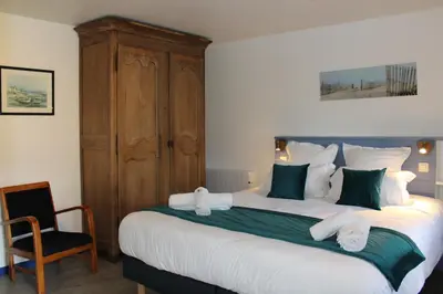 Un ou plusieurs lits dans un hébergement de l'établissement Domaine Des Piéris - Chambres d'Hôtes
