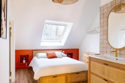 Un ou plusieurs lits dans un hébergement de l'établissement Superbe duplex avec vue