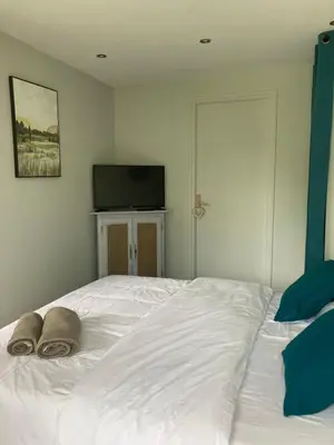 Un ou plusieurs lits dans un hébergement de l'établissement Maison proche mer
