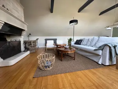 Télévision ou salle de divertissement dans l'établissement Maison proche mer
