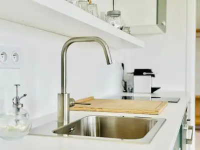 Cuisine ou kitchenette dans l'établissement Le Refuge de lAlbatros Vert