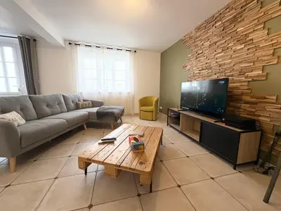 Télévision ou salle de divertissement dans l'établissement Chez Gabin