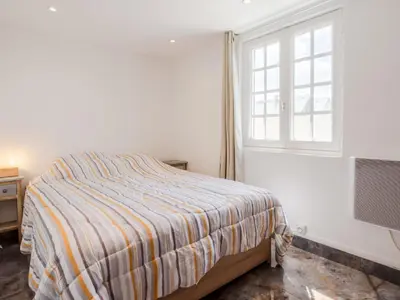 Un ou plusieurs lits dans un hébergement de l'établissement Holiday Home Jade by Interhome