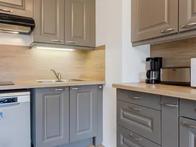 Cuisine ou kitchenette dans l'établissement Apartment Le Sporting-17 by Interhome