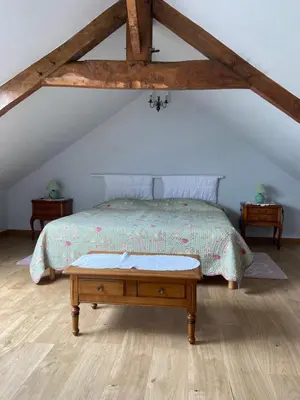 Un ou plusieurs lits dans un hébergement de l'établissement Le Camp Romain, maison familiale avec terrain