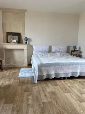 Un ou plusieurs lits dans un hébergement de l'établissement Le Camp Romain, maison familiale avec terrain