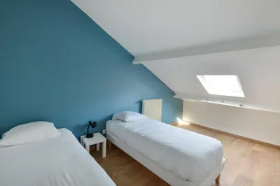 Un ou plusieurs lits dans un hébergement de l'établissement Maison Ampalia - Welkeys