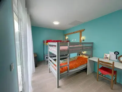 Un ou plusieurs lits dans un hébergement de l'établissement Maison familiale proche de Varaville avec jardin clos et terrasse