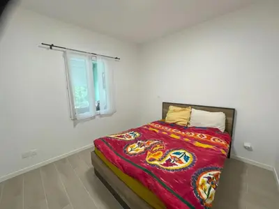 Un ou plusieurs lits dans un hébergement de l'établissement Maison familiale proche de Varaville avec jardin clos et terrasse