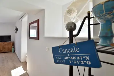 Télévision ou salle de divertissement dans l'établissement L'Aviron 35 - Appt vue mer
