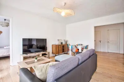 Télévision ou salle de divertissement dans l'établissement Appartement 