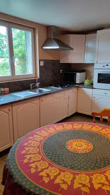 Cuisine ou kitchenette dans l'établissement Chambre d'Hôtes La Closerie