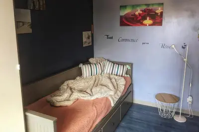 Un ou plusieurs lits dans un hébergement de l'établissement Appartement vue mer et plage Saint-Aubin-Sur-Mer Normandie