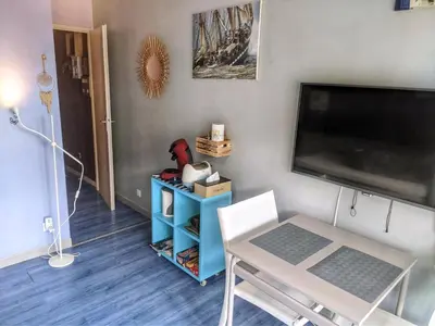 Télévision ou salle de divertissement dans l'établissement Appartement vue mer et plage Saint-Aubin-Sur-Mer Normandie