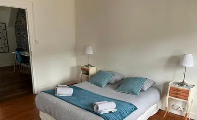 Un ou plusieurs lits dans un hébergement de l'établissement Appartement douillet
