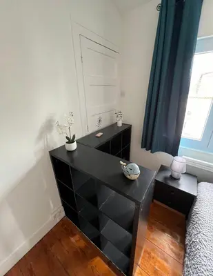 Coin salon dans l'établissement Appartement douillet