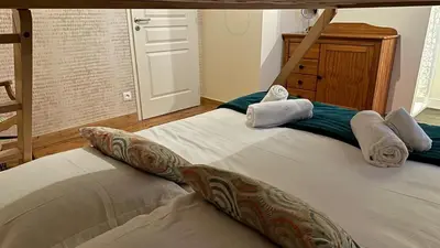 Un ou plusieurs lits dans un hébergement de l'établissement Appartement 8 personnes Normandie