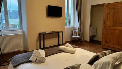 Un ou plusieurs lits dans un hébergement de l'établissement Appartement 8 personnes Normandie