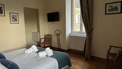 Un ou plusieurs lits dans un hébergement de l'établissement Appartement 8 personnes Normandie