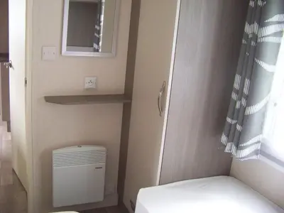 Un ou plusieurs lits dans un hébergement de l'établissement Mobil home Céleste 6-8 personnes