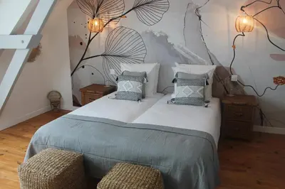 Un ou plusieurs lits dans un hébergement de l'établissement Les 13 lavoirs d'antan - chambre zen attitude