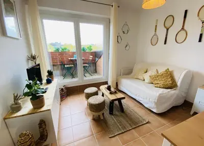 Coin salon dans l'établissement Chez Marcel Cabourg Appartement 2 pièces
