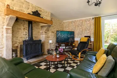 Coin salon dans l'établissement Les 13 lavoirs d'antan - chambre la belle époque