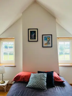 Un ou plusieurs lits dans un hébergement de l'établissement La Maison Poésie