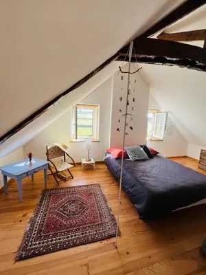 Un ou plusieurs lits dans un hébergement de l'établissement La Maison Poésie