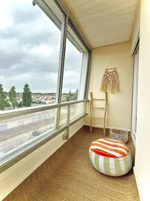 Coin salon dans l'établissement Appartement Bord de mer, accès direct plage