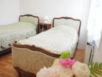 Un ou plusieurs lits dans un hébergement de l'établissement Chambre d'Hôtes de l'Île