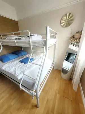 Un ou plusieurs lits dans un hébergement de l'établissement Duplex les pieds dans l'eau