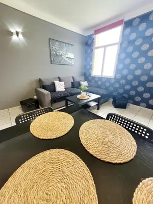 Coin salon dans l'établissement Duplex les pieds dans l'eau
